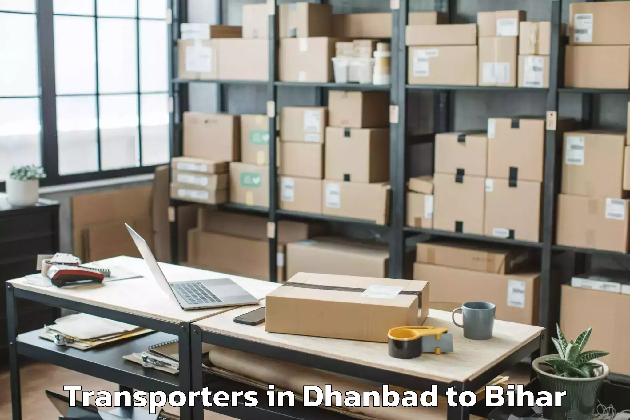 Easy Dhanbad to Bela Transporters Booking